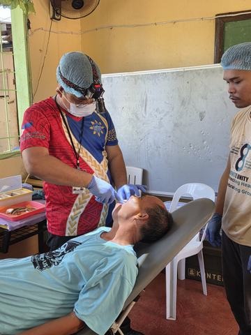 A photograph from an ARMS outreach.