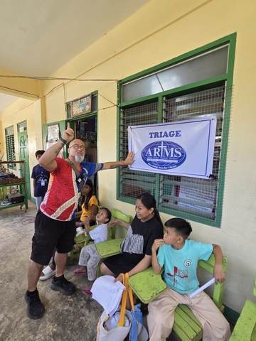 A photograph from an ARMS outreach.