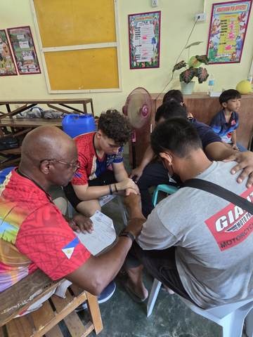 A photograph from an ARMS outreach.