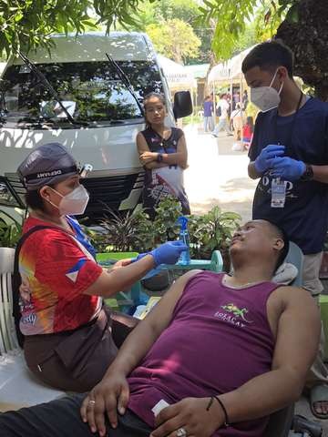 A photograph from an ARMS outreach.