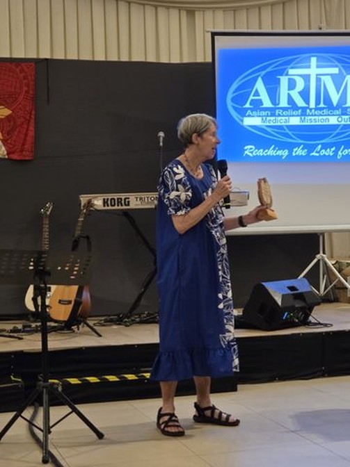 A photograph from an ARMS outreach.