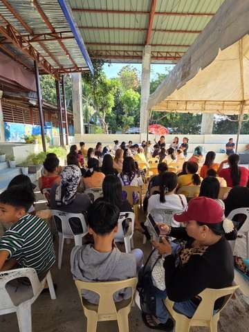 A photograph from an ARMS outreach.