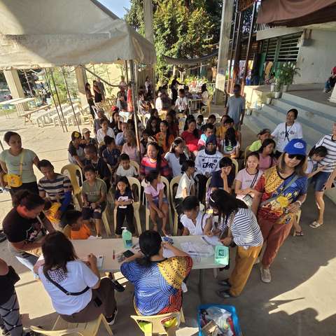 A photograph from an ARMS outreach.