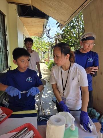 A photograph from an ARMS outreach.